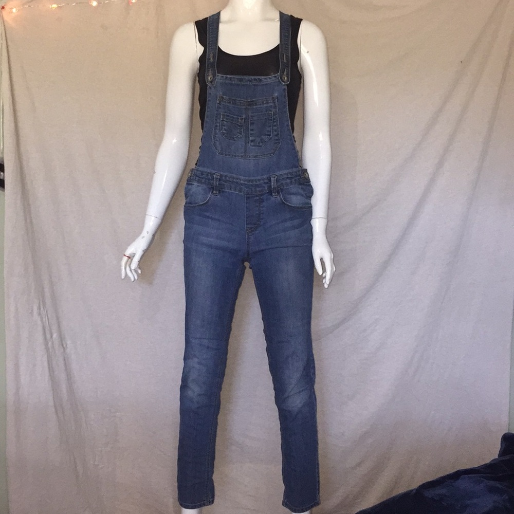 Blue skinny jean overalls